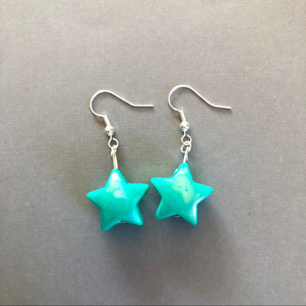 Blue color shift star earrings